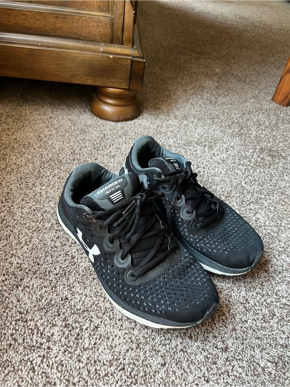 Under Armour Charged Impulse running shoes.